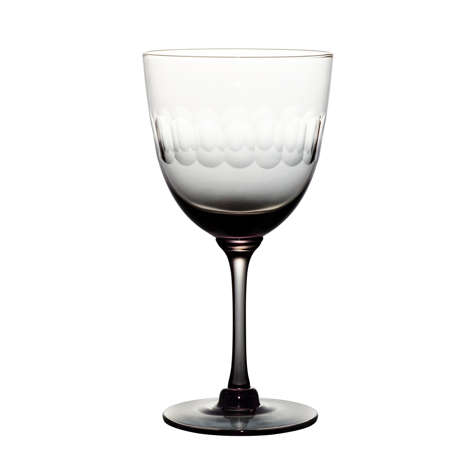 four smoky crystal wine glasses with lens design