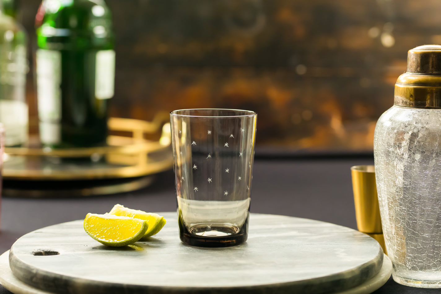 four smoky crystal tumblers with stars design