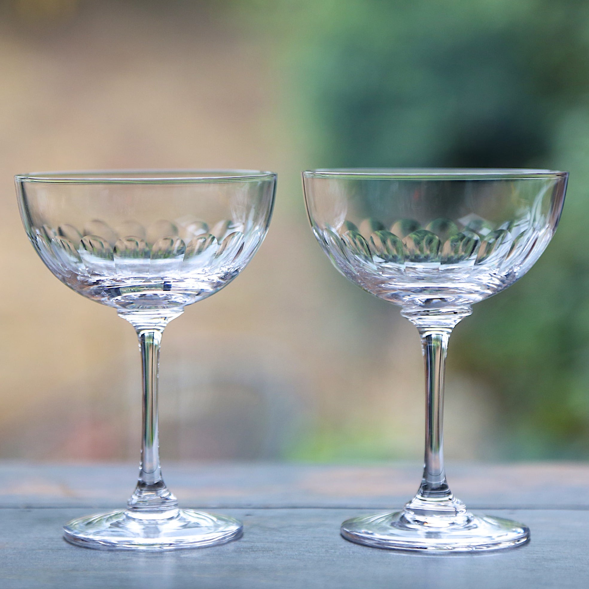 A Pair of Crystal Champagne Saucers with Lens Design