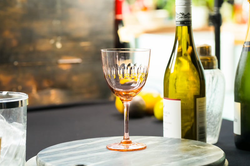 four rose crystal wine glasses with lens design