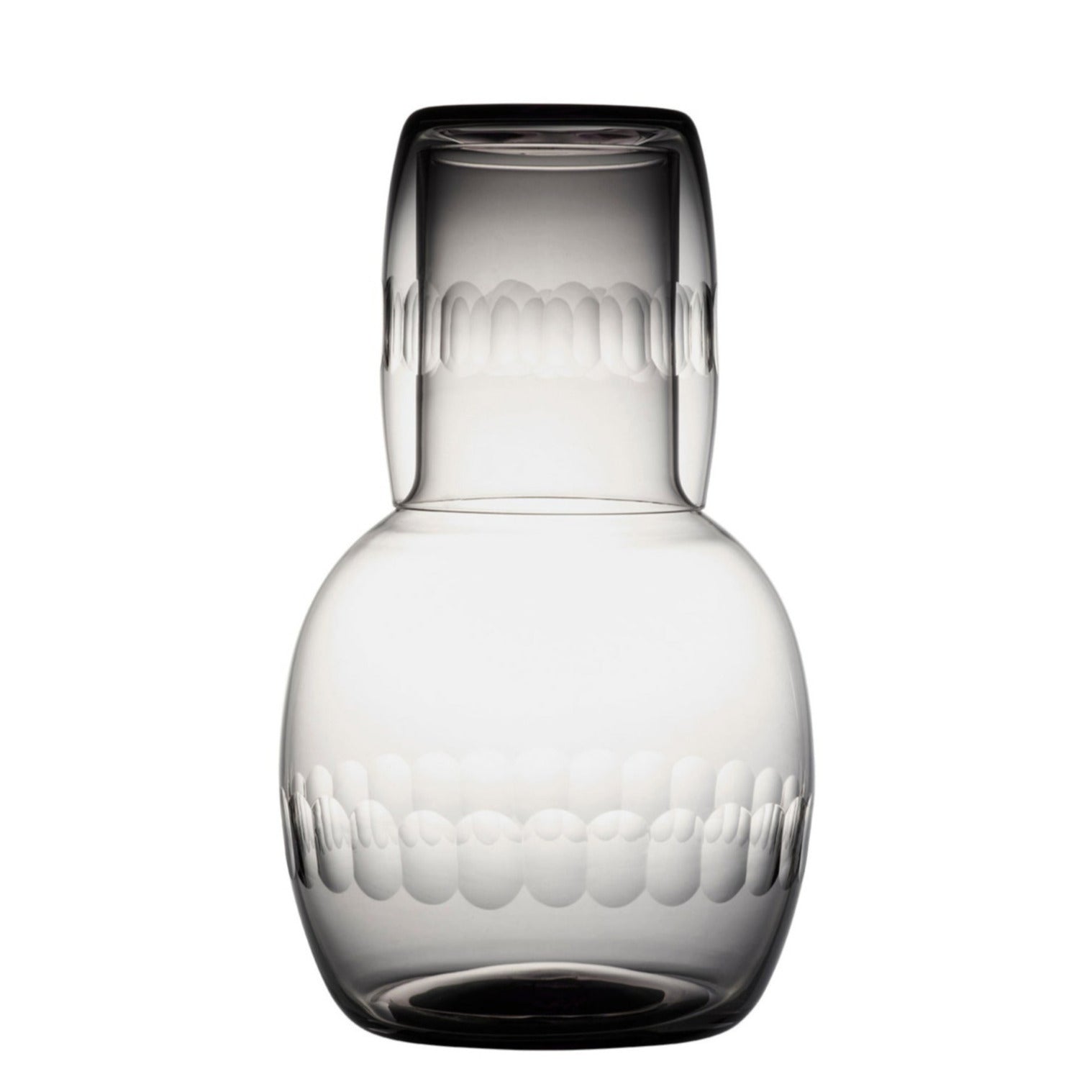 A smoky crystal carafe set with lens design