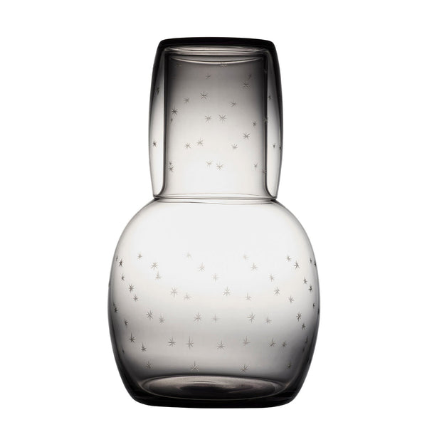 A smoky crystal carafe set with stars design