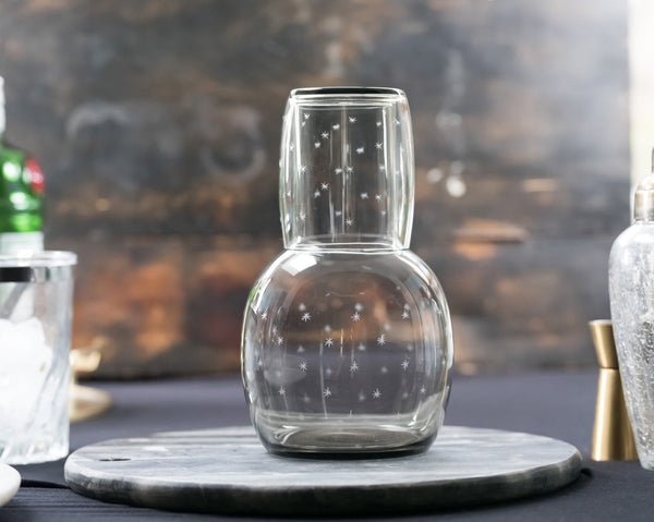 A smoky crystal carafe set with stars design