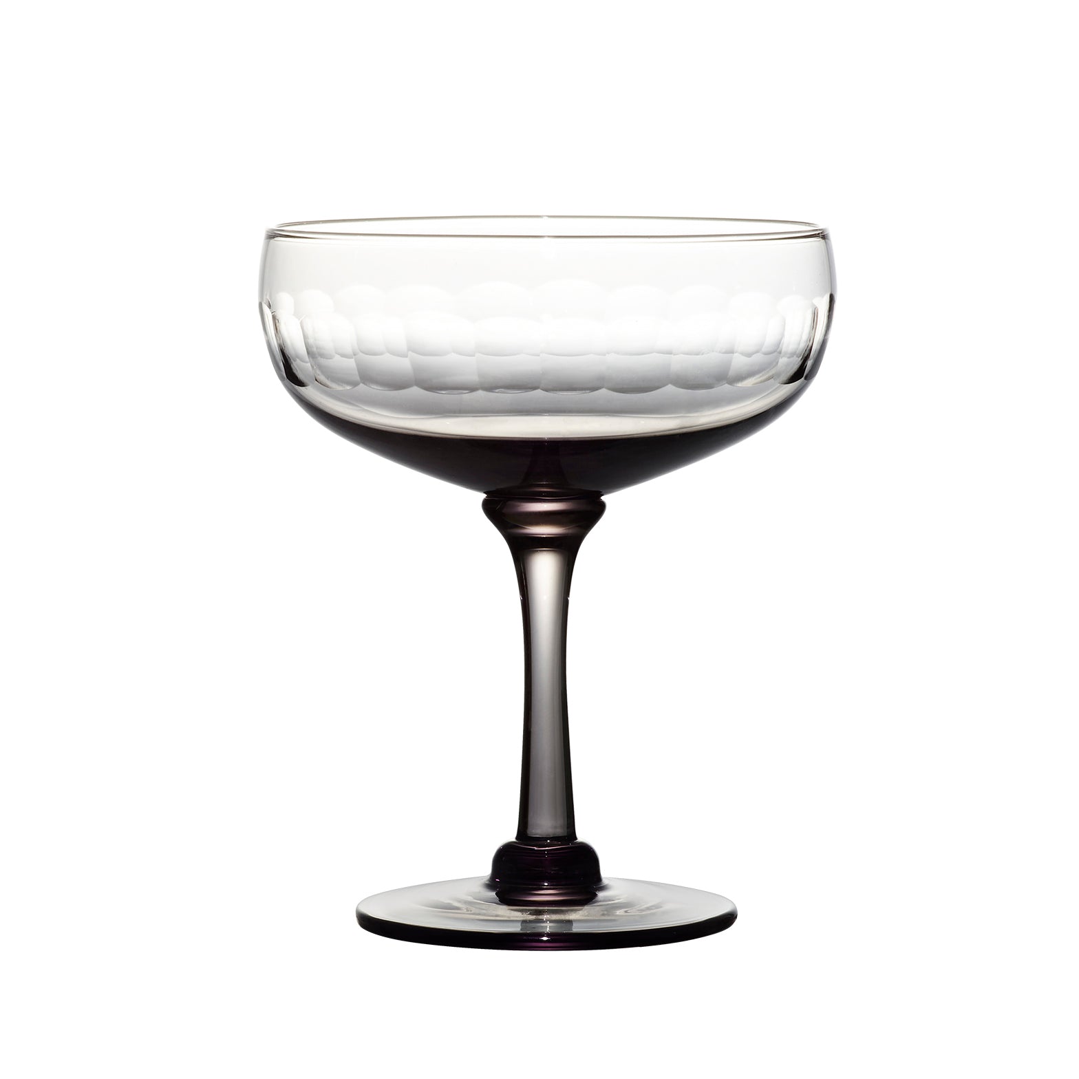 four smoky crystal cocktail glasses with lens design