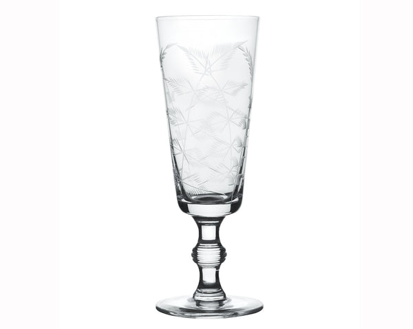 A Set of Four Crystal Champagne Flutes with Fern Design