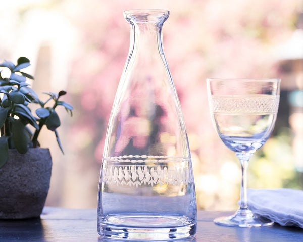 A Crystal Table Carafe with Ovals Design