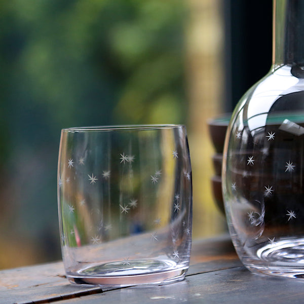 A Set of Four Crystal Carafe Glasses